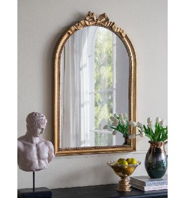 stockholm arched gold bow mirror