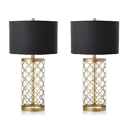 2x golden hollowed out base table lamp with dark shade